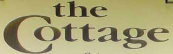 Logo of The Cottage in Lake Placid, NY